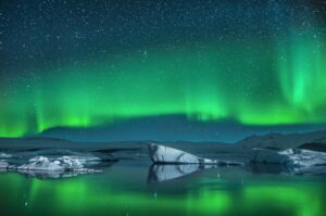 icebergs-under-the-northern-lights-greenland-secret-atlas.jpg